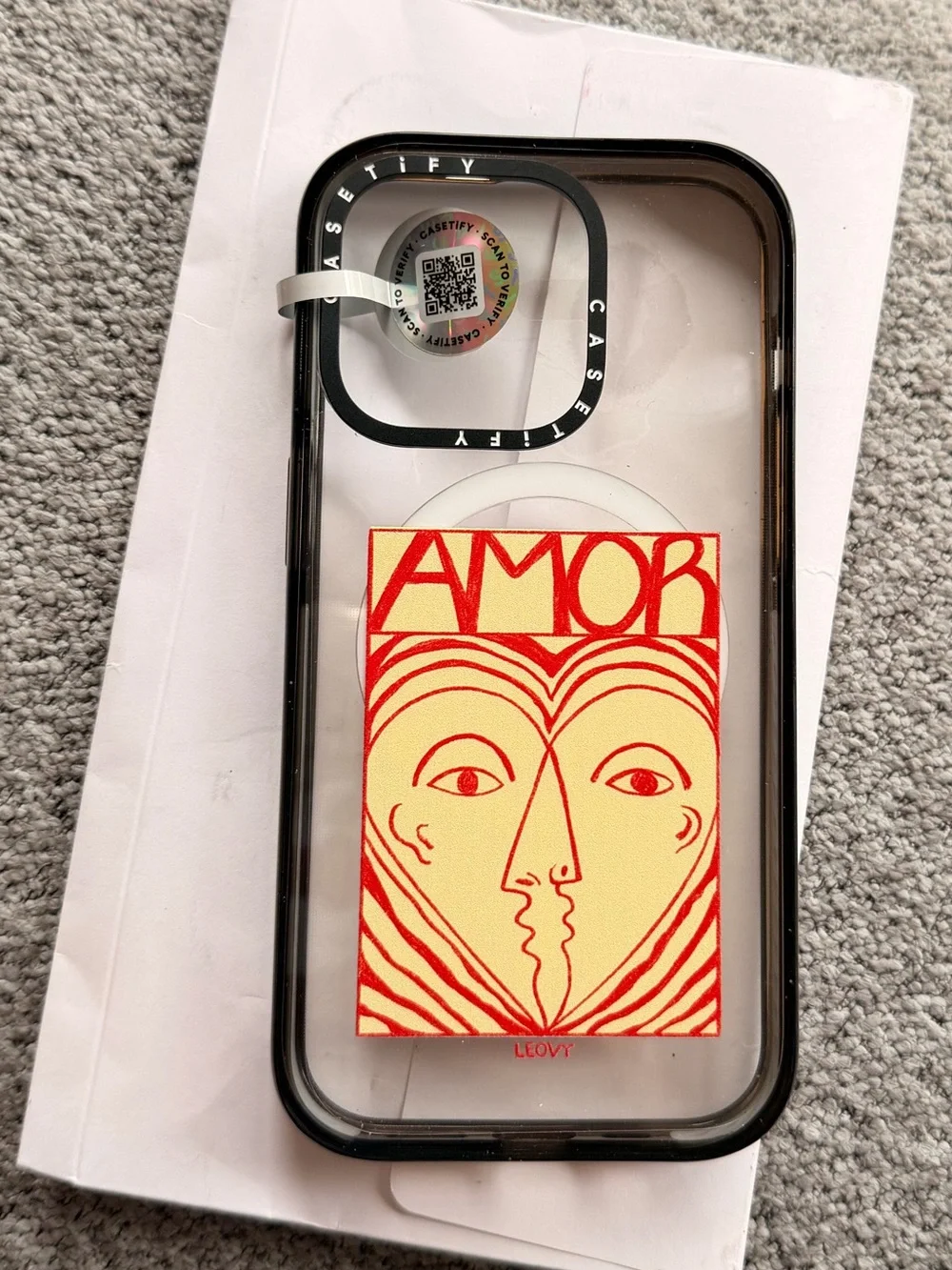 Casetify Clear Case with Black Bumper and Red & Cream AMOR Card